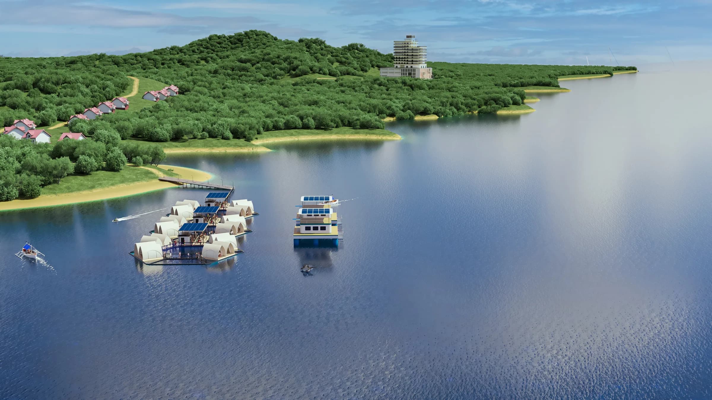 A wide daylight view across blue water to a small cluster of white Glamphouses and ArkPad unit moored off a densely wooded green shoreline, with a tall tower building on the headland and kayakers in the foreground